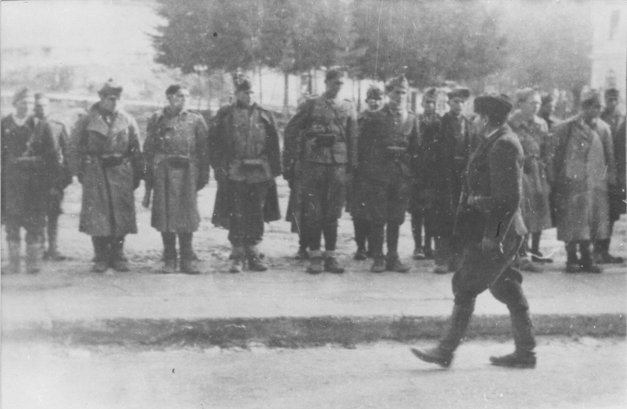 Josip Broz Tito conducts a review of one battalion of the 3rd Krajina Brigade after the battles for Bihac, in Bihac 1942.