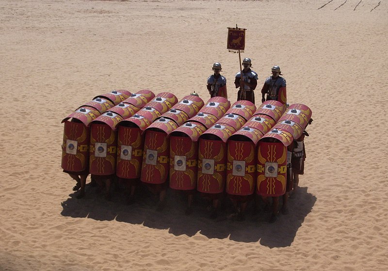 The testudo formation in a Roman military reenactment