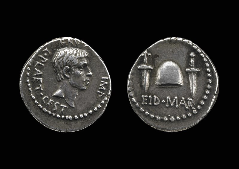 Ides of March coin minted by Brutus in 43–42 BC. The daggers and pileus celebrate the assassination of Julius Caesar