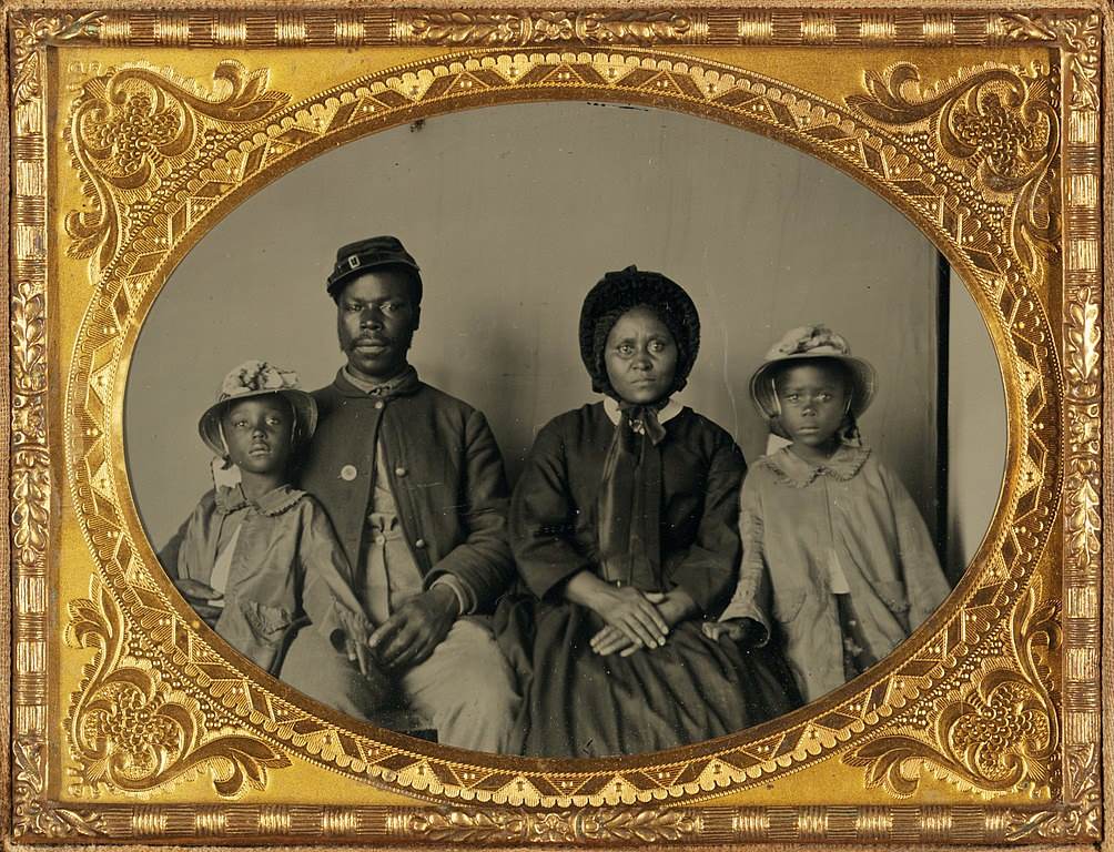 Sgt. Samuel Smith of the 119th USCT, in uniform, with his family
