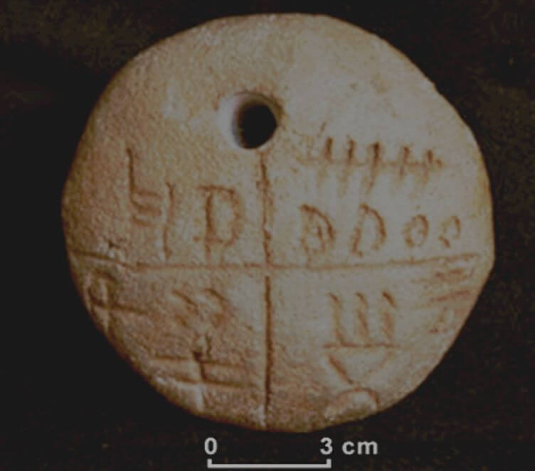 Tablet with Vinča inscription from the period 5500-5300, Tartaria, Romania.