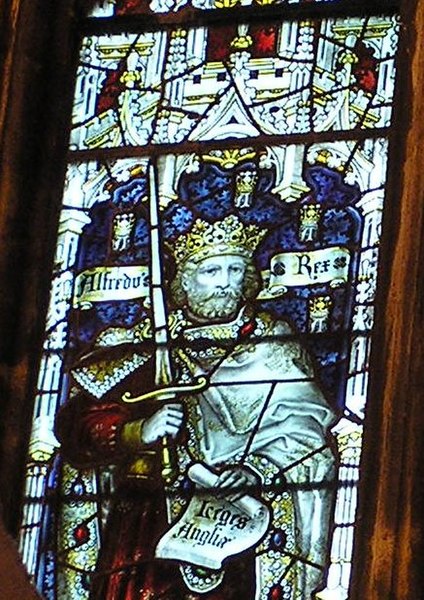 King Alfred the Great of England pictured in a stained glass window in the West Window of the South Transept of Bristol Cathedral.