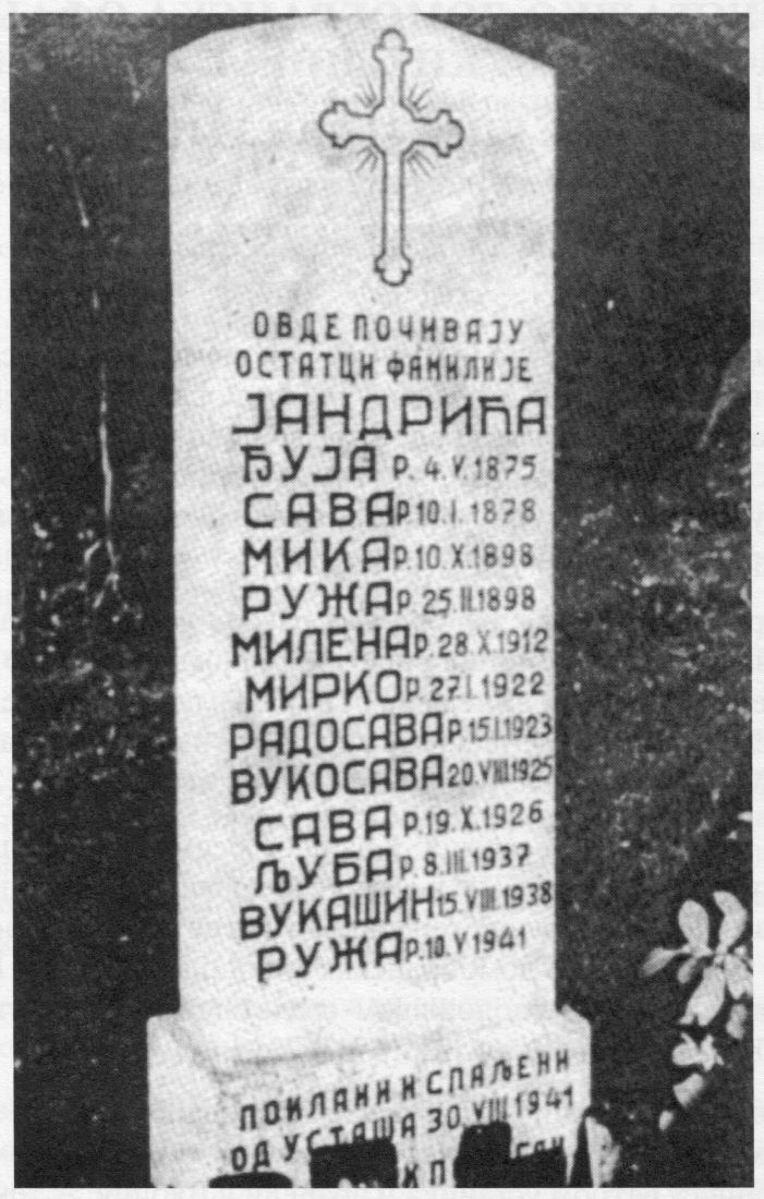 Monument to the Jandrić family, listing the names of the deceased and their dates of birth. The youngest girl was only a few months old.