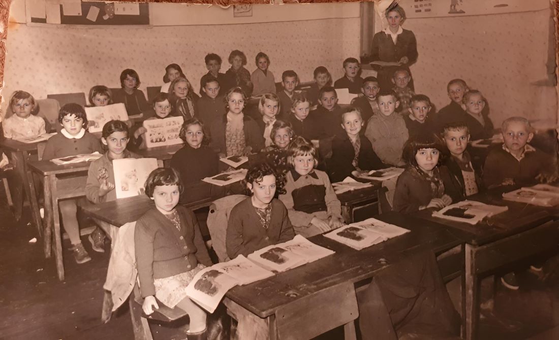 Students in a primary school, after World War II. A new generation defying destruction, pictured in the 1950s.