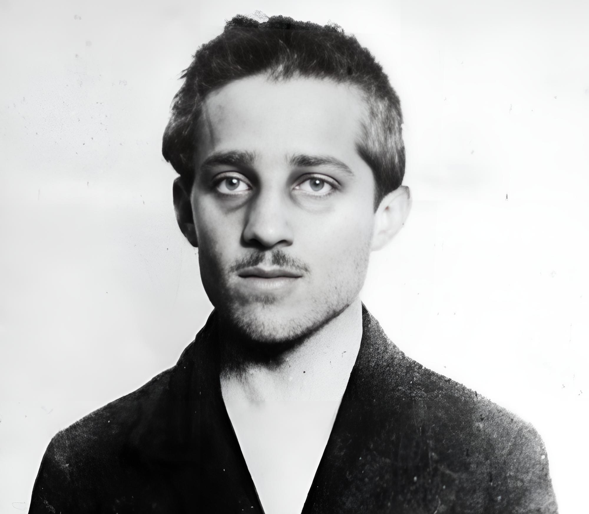 Gavrilo Princip in his cell, with his physical appearance slightly altered due to the harsh conditions and torture he endured.