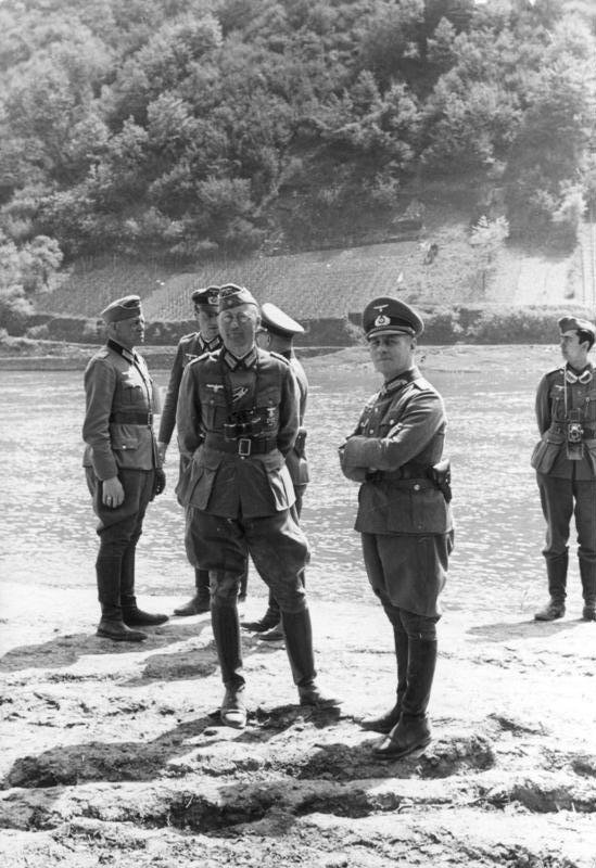 Rommel and his staff observed troops of the 7th Panzer Division conducting river-crossing exercises on the Moselle River in France, 1940.