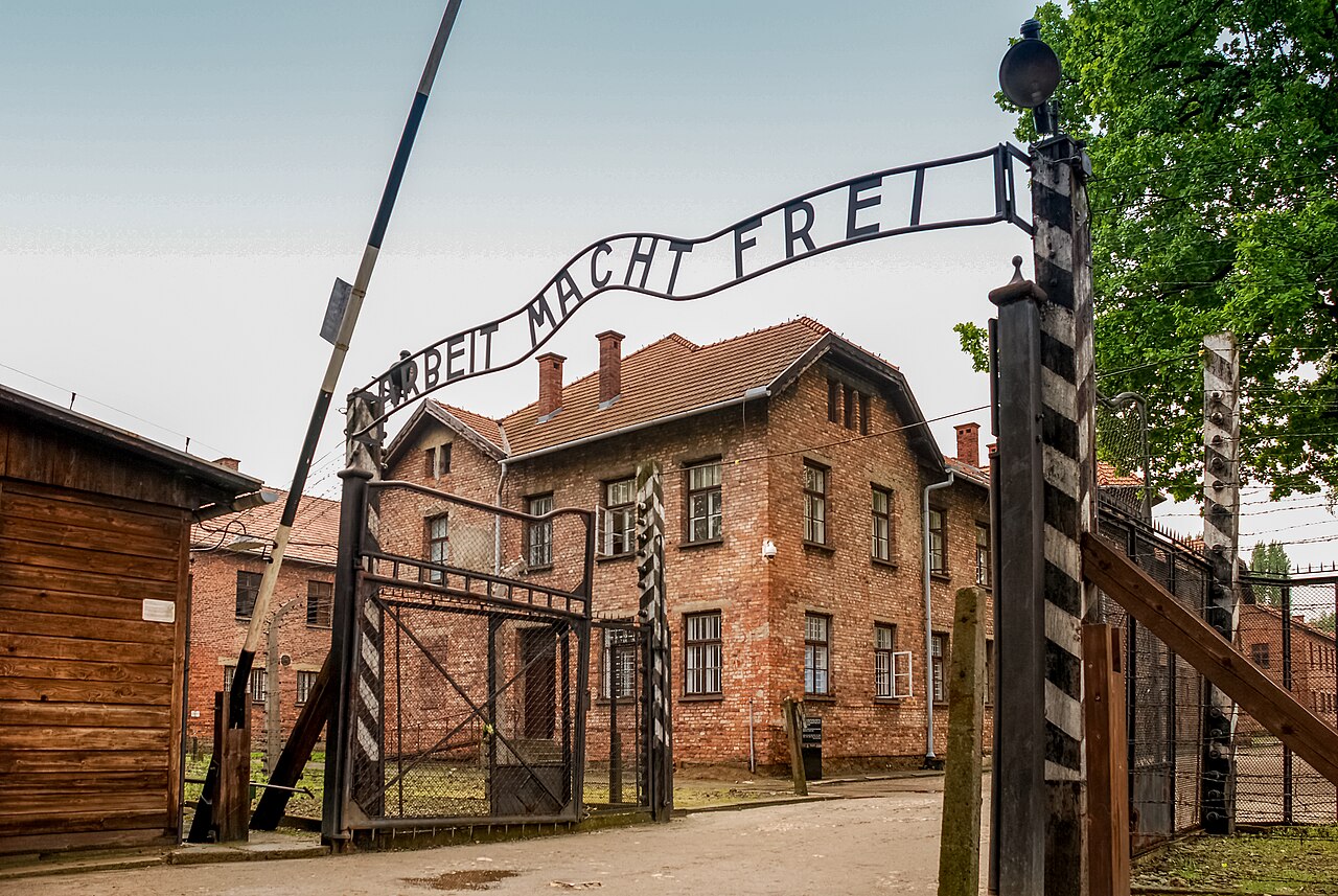 Gate to Auschwitz I with its Arbeit macht frei sign - work sets you free