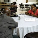An Evergreen Protective Association volunteer recording an oral history at Greater Rosemont History Day
