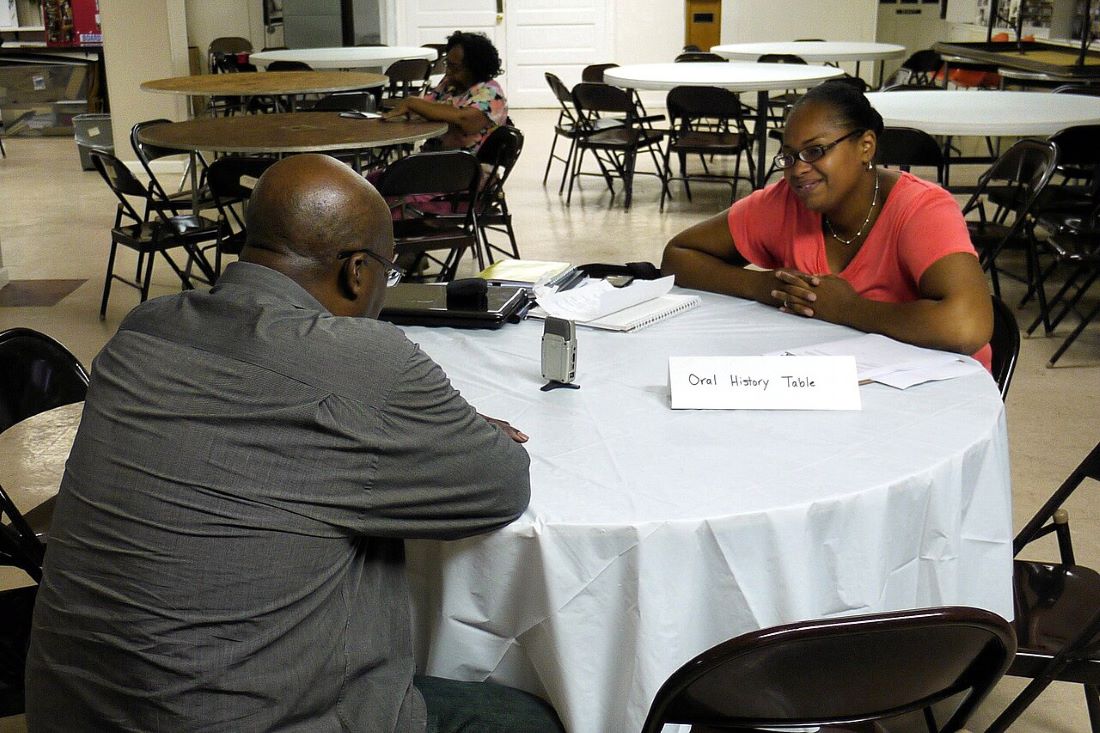 An Evergreen Protective Association volunteer recording an oral history at Greater Rosemont History Day